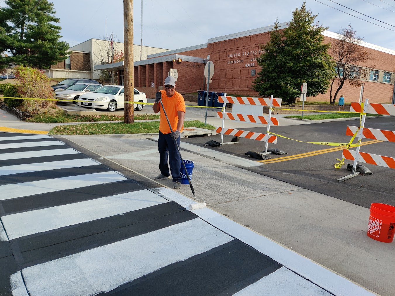 Steve Beavers applying coating on a crosswalk project